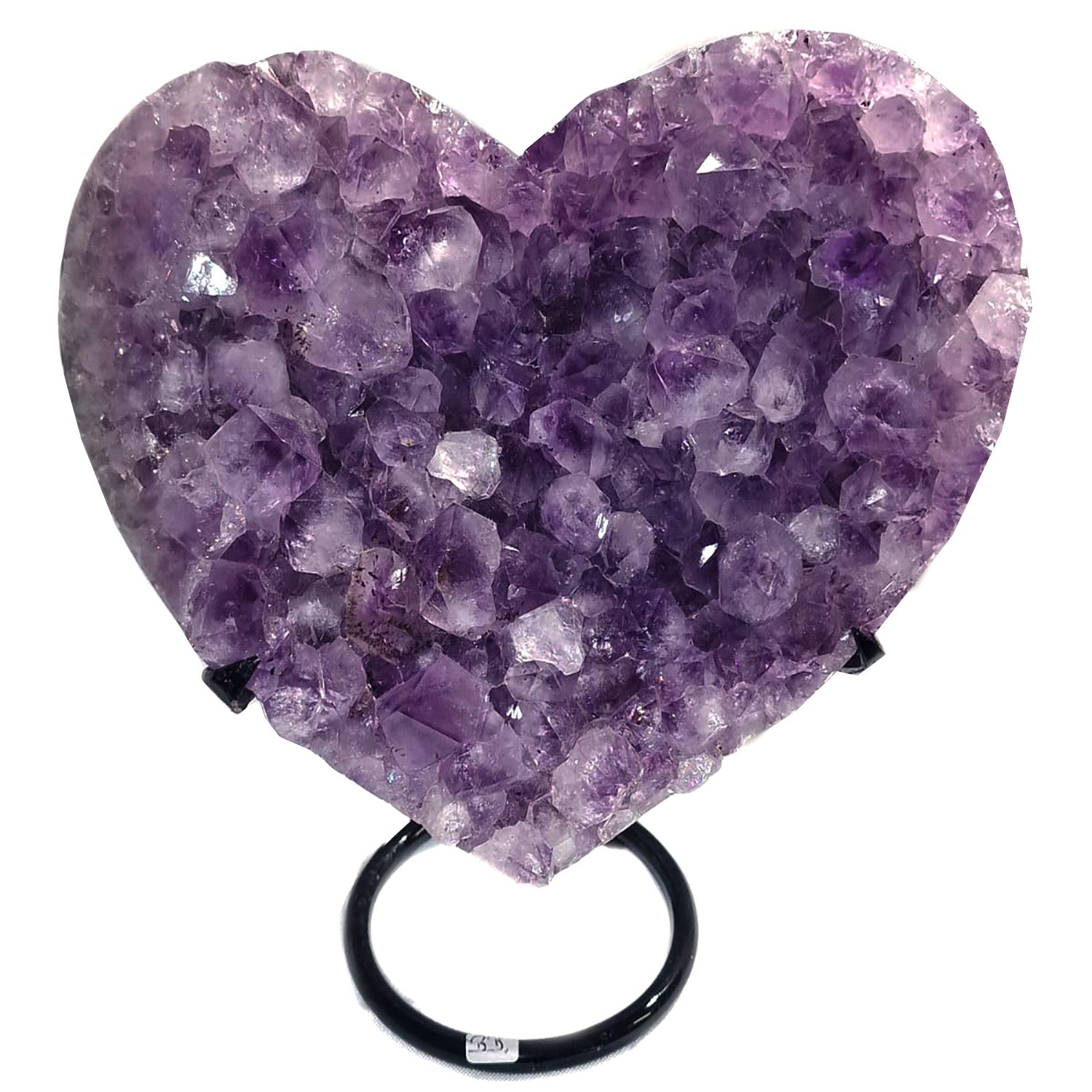 3.5kg Amethyst Heart displayed on a sleek metal stand. The heart features vibrant purple crystalline formations, highlighting Amethyst's calming and protective qualities. This compact and elegant piece is ideal for home décor, meditation spaces, or as a thoughtful gift for crystal lovers.