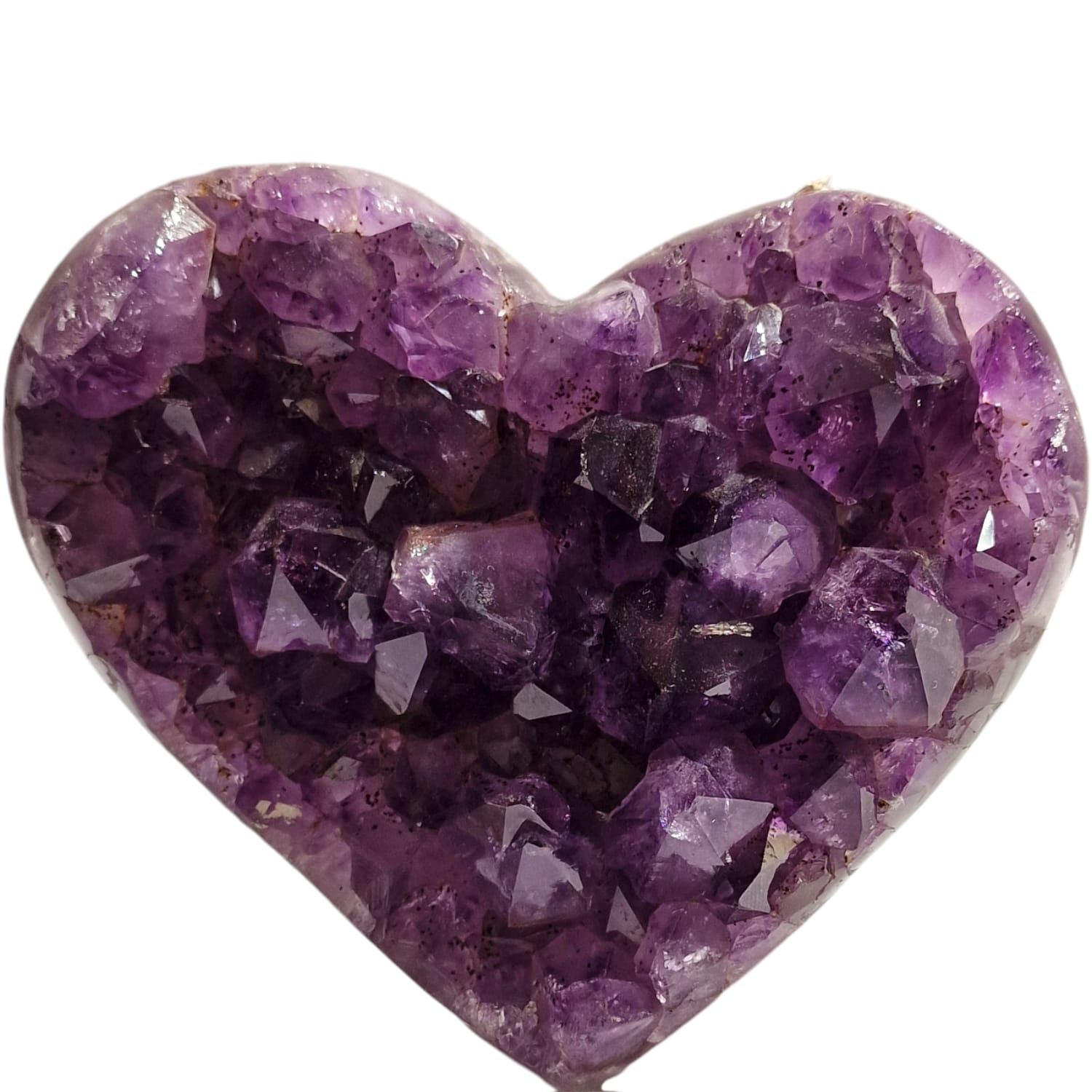 Amethyst Heart on a Display Stand – a stunning purple crystal heart on a sleek stand, radiating calming energy and beauty, ideal for home or office decor.