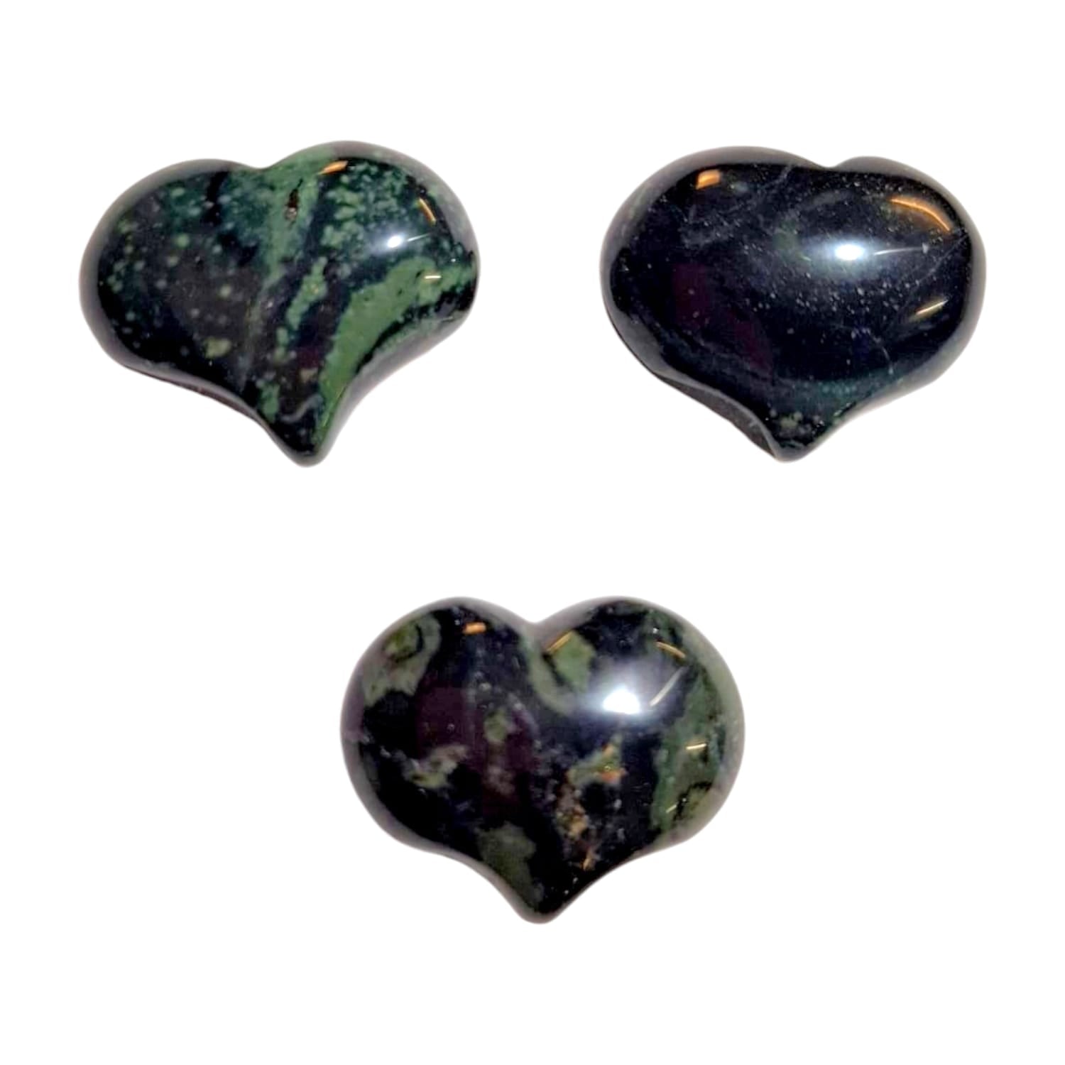 A small, polished puff heart crafted by GeoFossils from Kambaba jasper, also known as crocodile jasper, featuring deep green tones with unique, dark circular patterns reminiscent of fossilised algae. The heart has a smooth, rounded shape, showcasing the stone’s distinctive, earthy marbling. The ancient, organic look of the Kambaba jasper heart evokes a sense of grounding, calm, and connection to nature’s ancient energy.