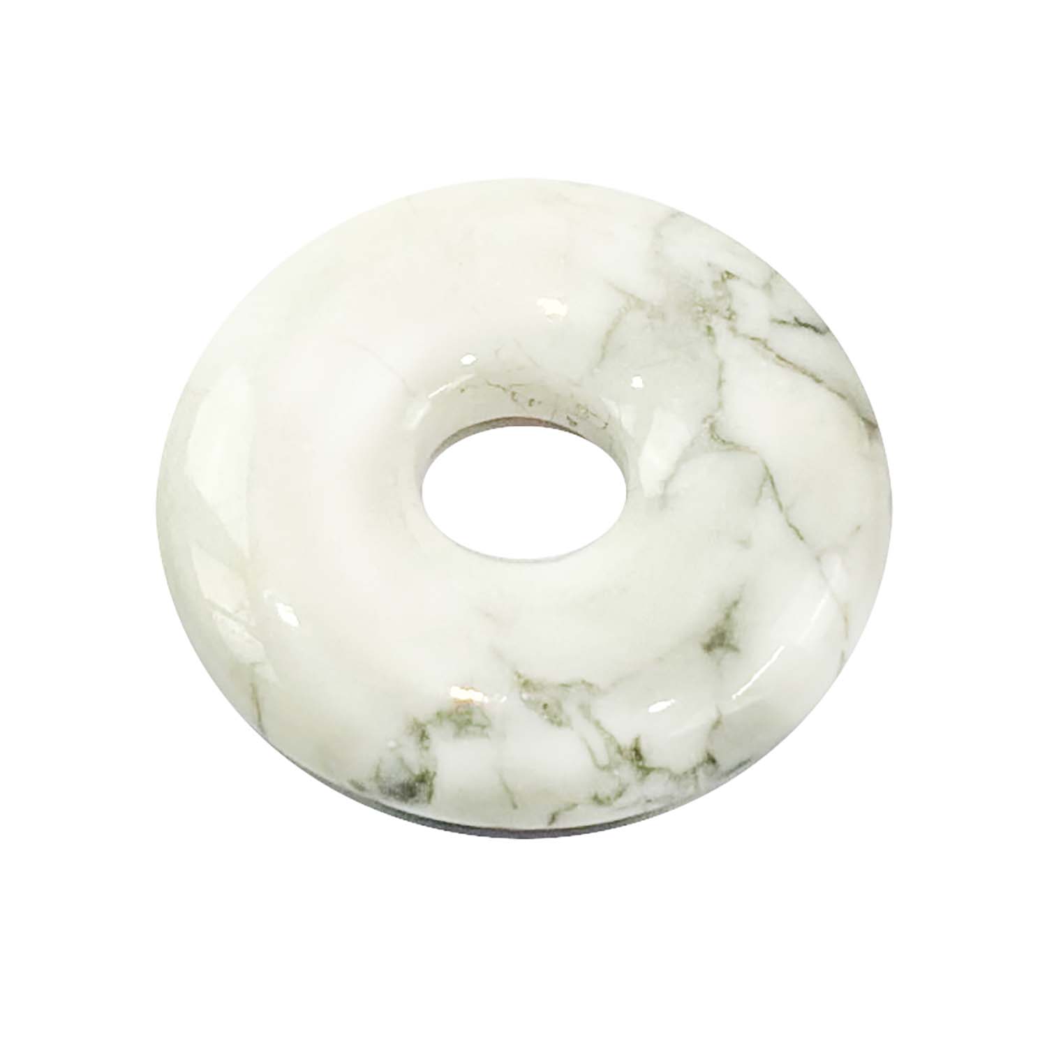 Howlite Munay Ki Pi Donut by GeoFossils – smooth, white circular stone with soft grey veining, perfect for relaxation, emotional balance, and connecting with the Crown Chakra in Andean spiritual practices.