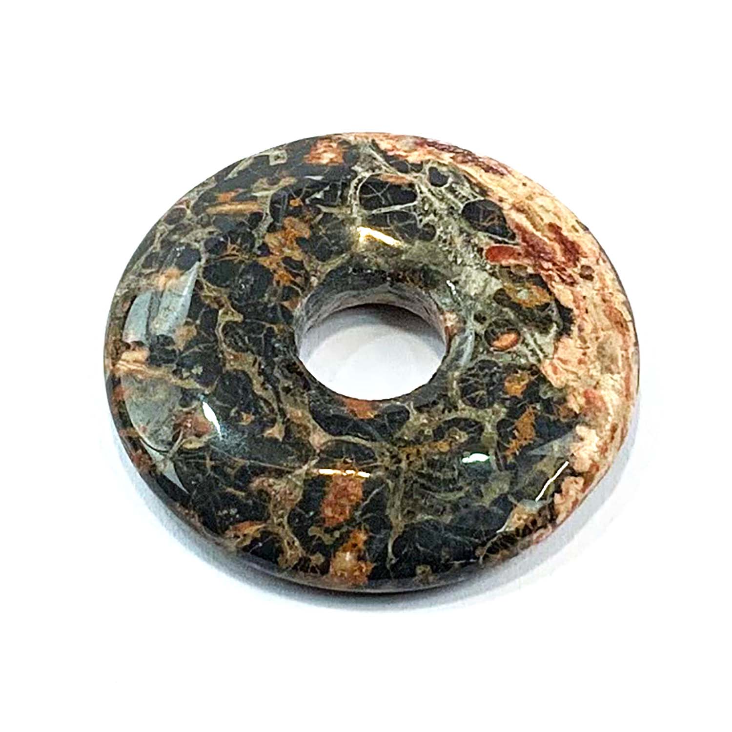 Leopard Skin Jasper Munay Ki Pi Donut by GeoFossils – smooth, earthy circular stone with leopard-like patterns, perfect for grounding, spiritual connection, and aligning with the Root Chakra in Andean spiritual practices.