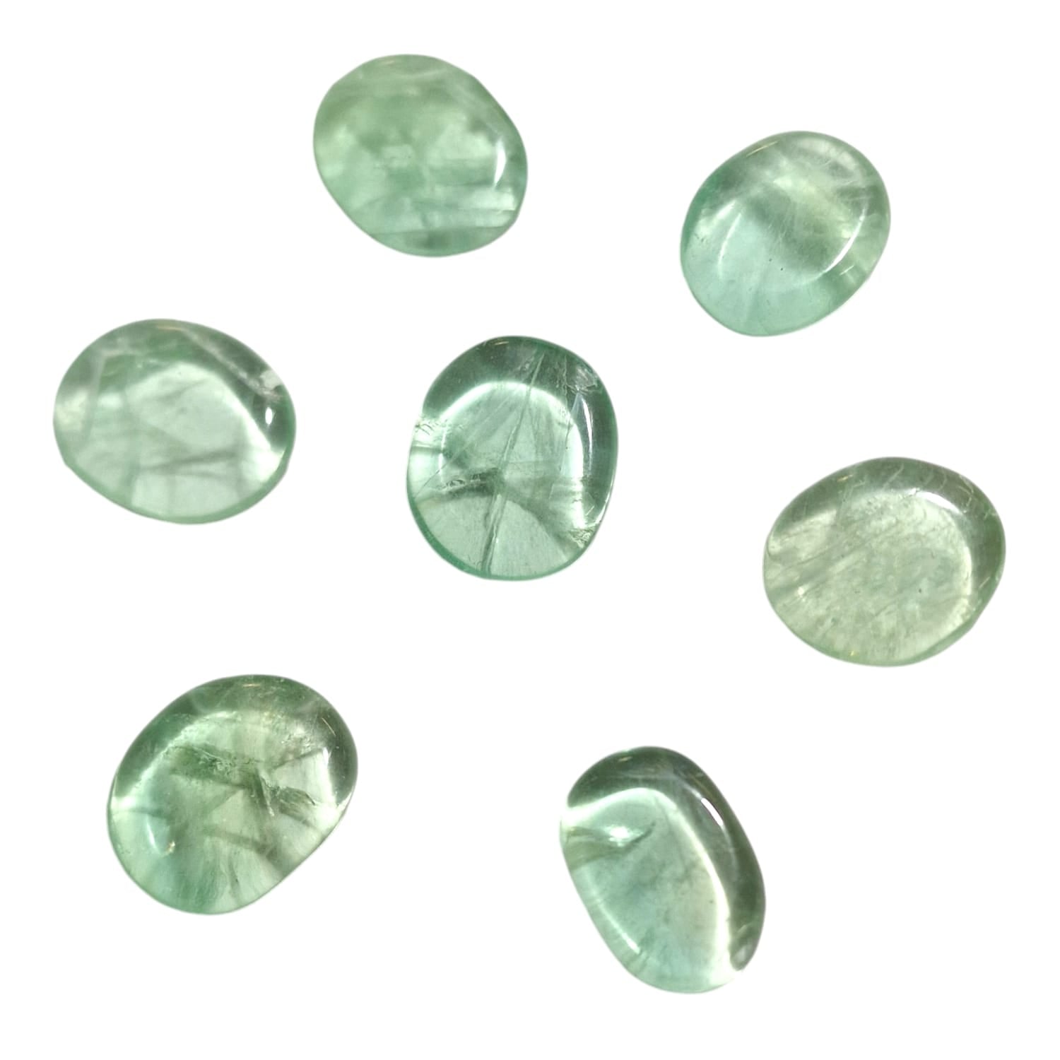 Green Fluorite Mini Oval – a soothing green crystal known for enhancing clarity, focus, and emotional balance. Ideal for clearing energy blockages and promoting mental sharpness.