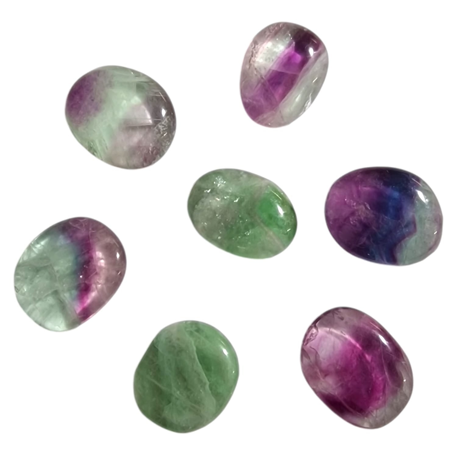 Rainbow Fluorite Mini Oval – a vibrant crystal featuring purples, greens, and blues, known for promoting clarity, focus, and emotional balance. Ideal for chakra alignment and spiritual growth