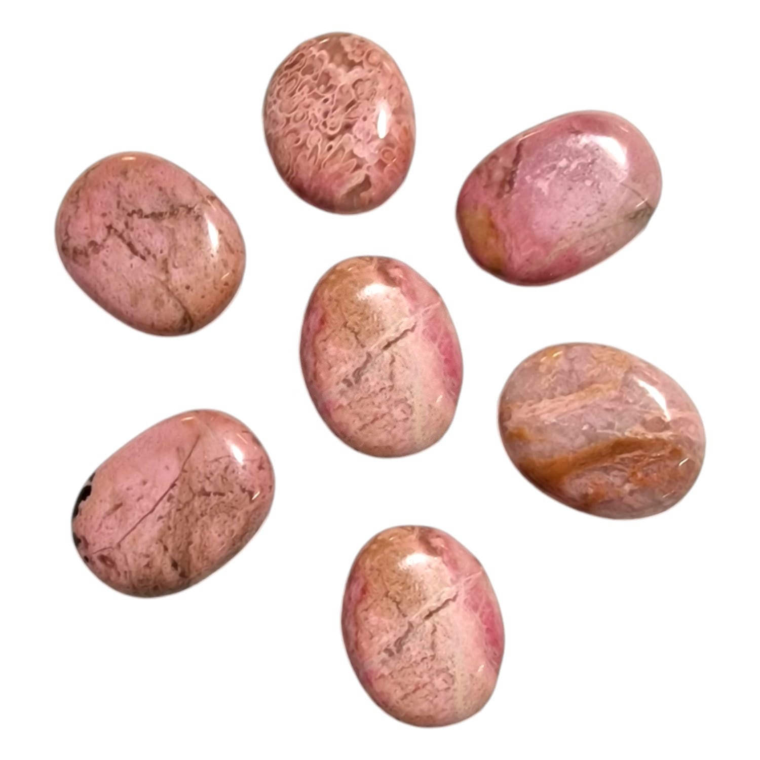 Rhodochrosite Mini Oval – a soft pink crystal known for promoting compassion, self-love, and emotional healing. Ideal for fostering forgiveness and emotional balance.