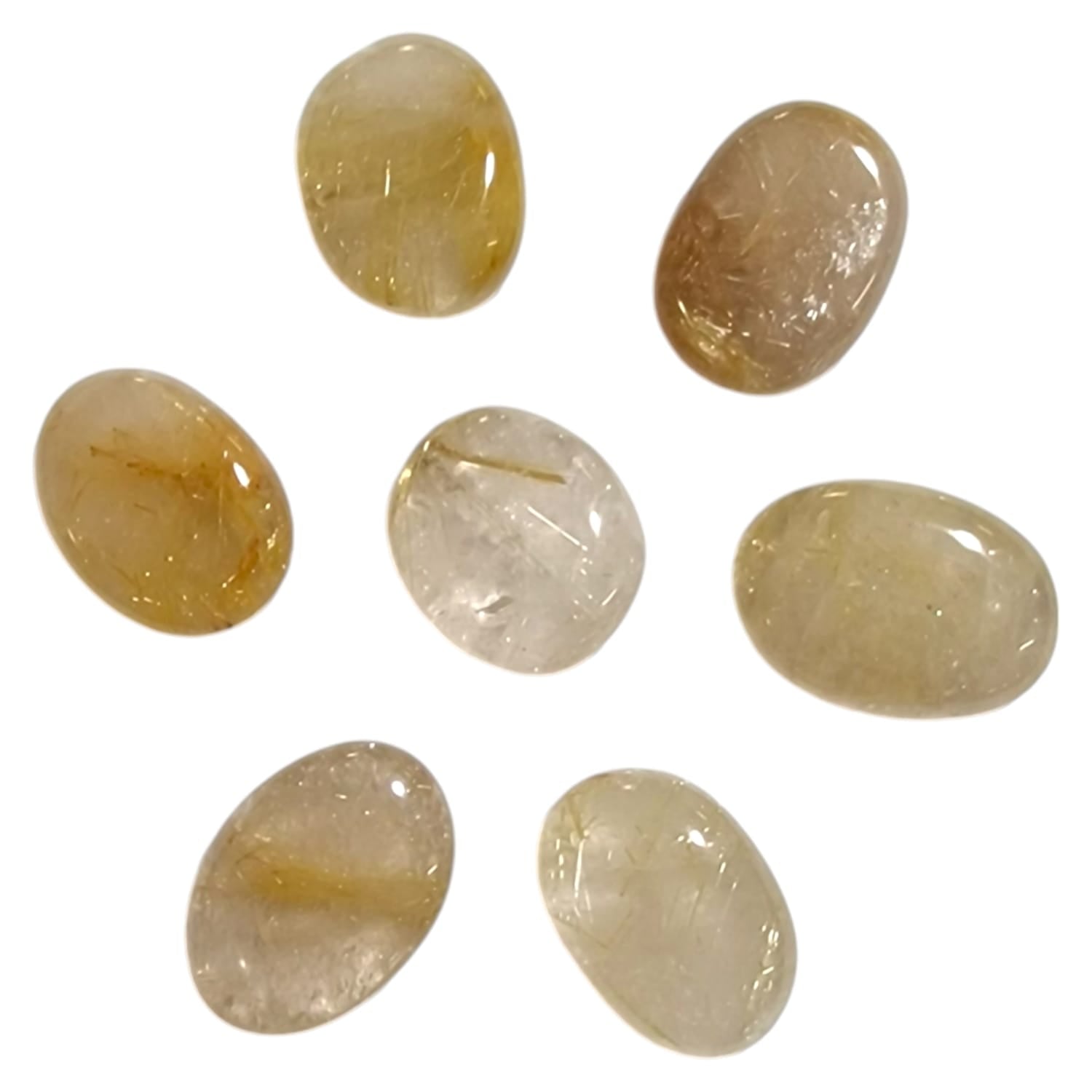 Rutilated Quartz Mini Oval by GeoFossils – smooth, clear stone with golden or silver rutile inclusions, perfect for amplification, clarity, and connecting with the Solar Plexus and Crown Chakras.